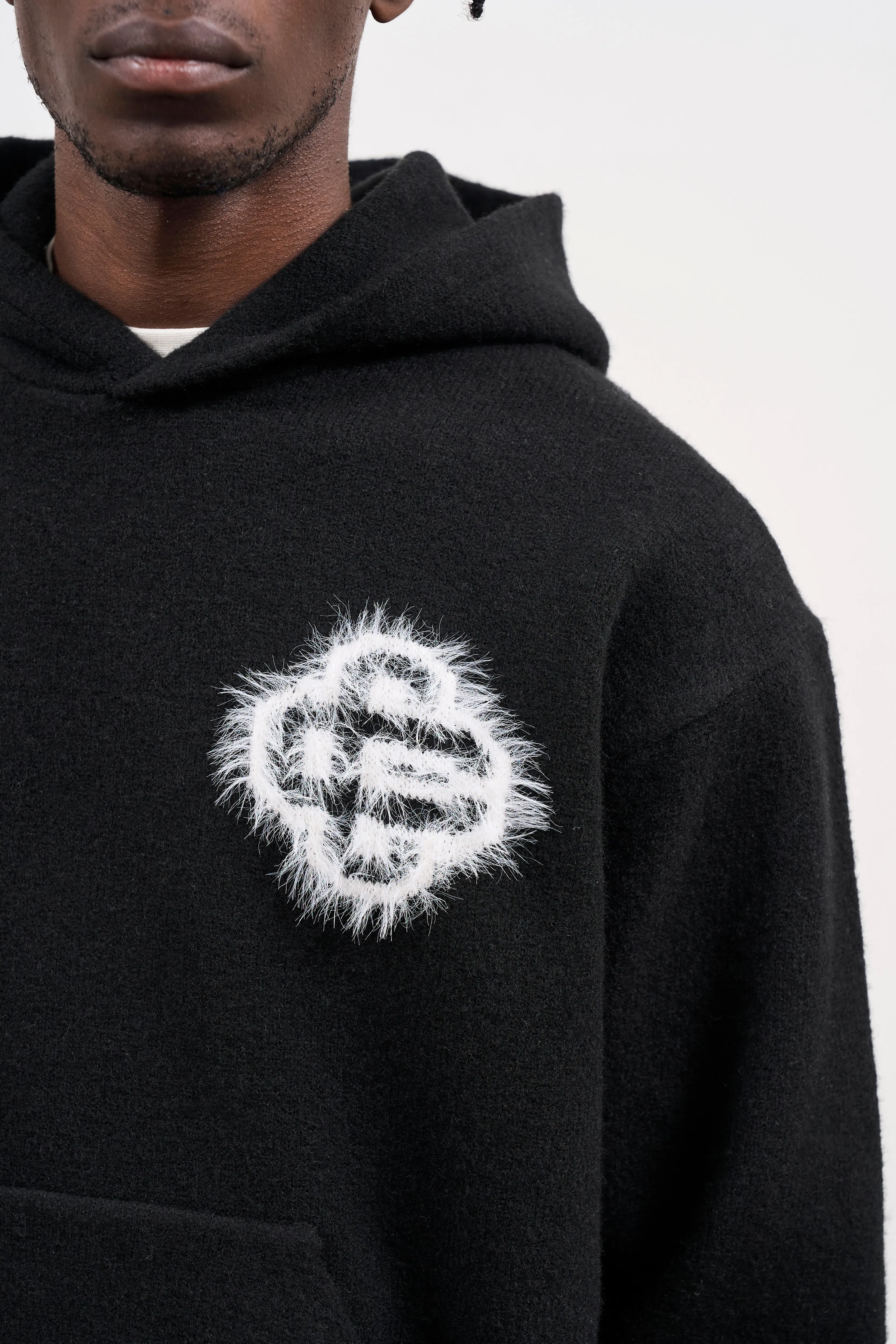 FLUFFY EMBLEM KNITTED HOODIE - BLACK