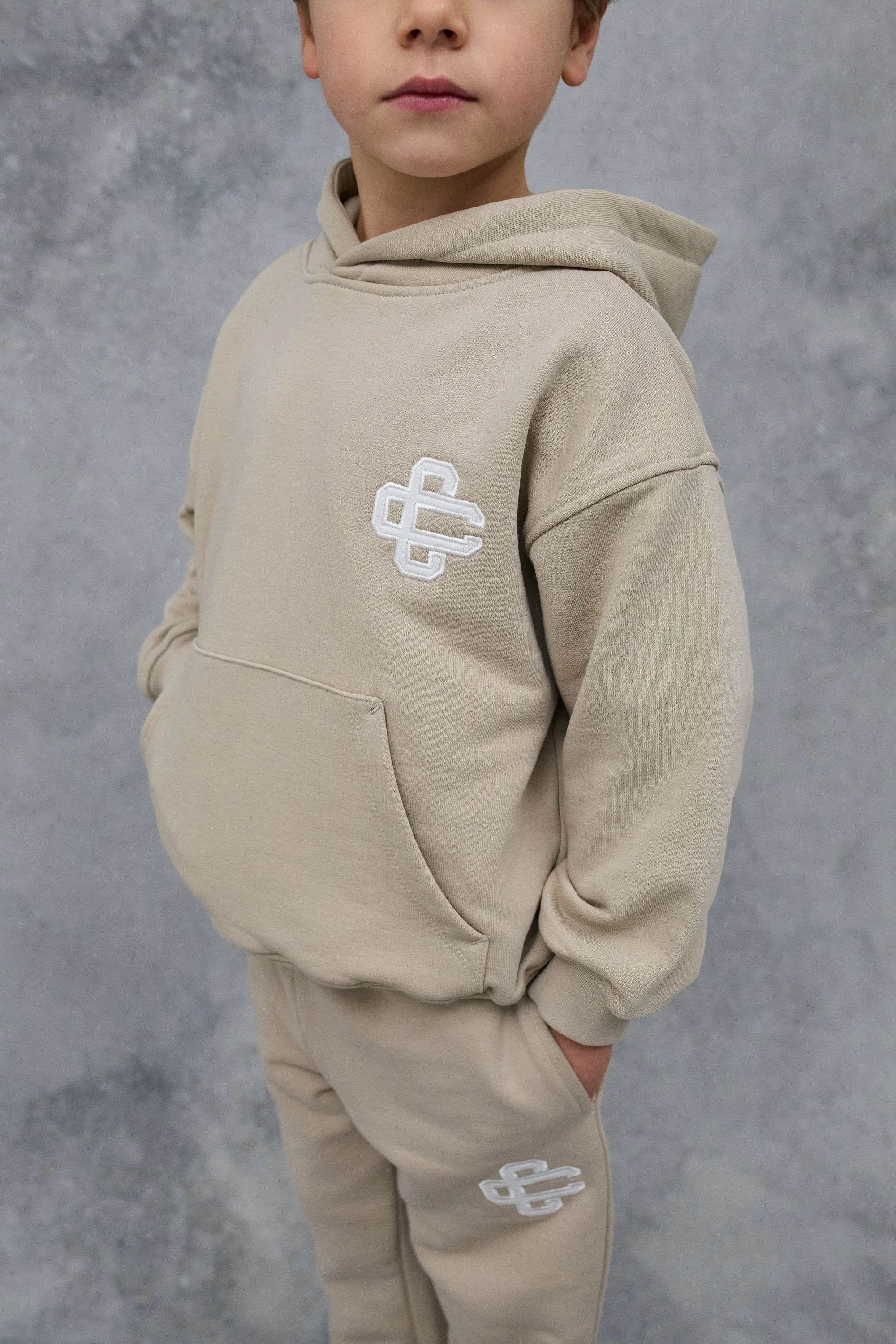 JNR EMBLEM APPLIQUE HOODIE - BEIGE