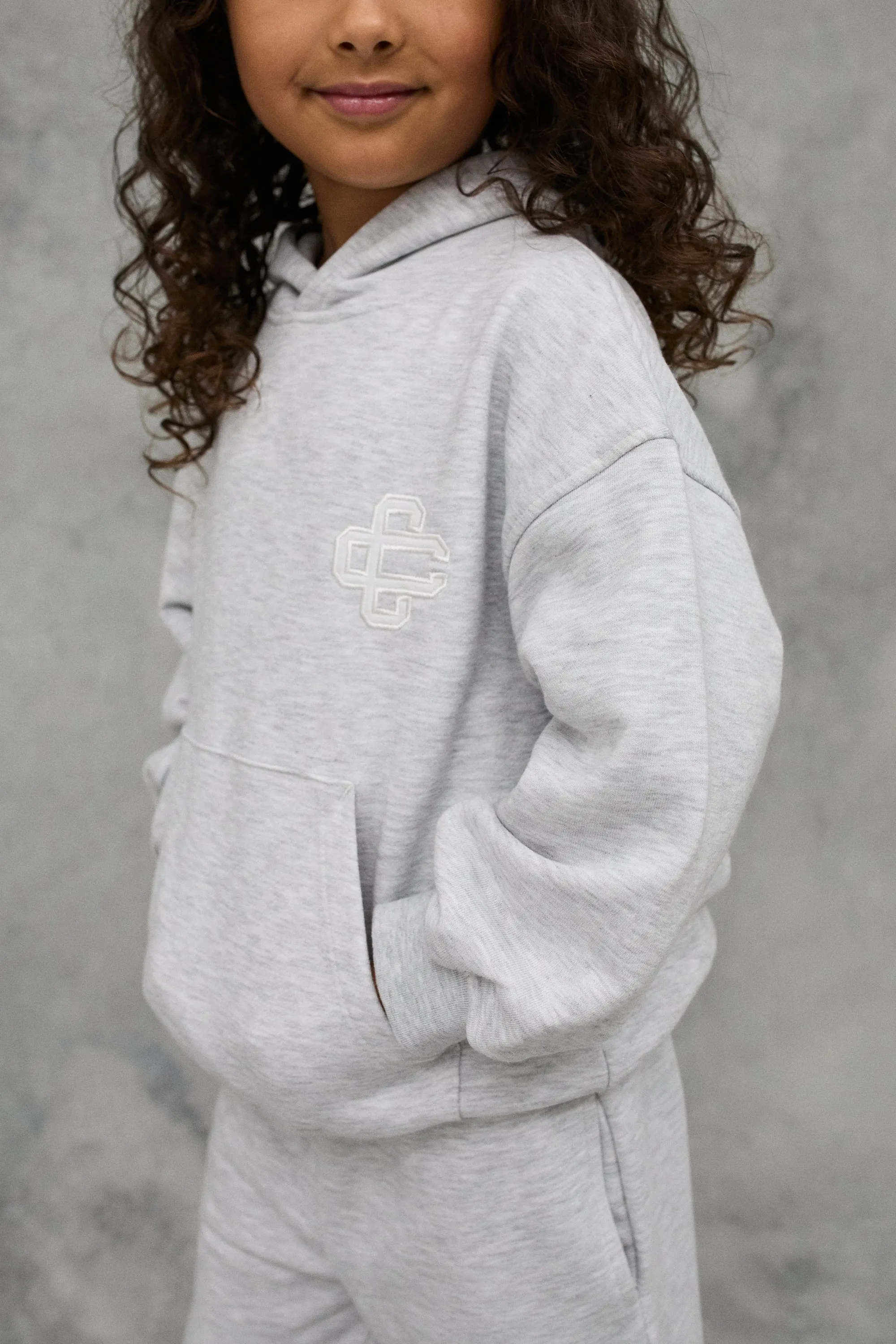 JNR EMBLEM APPLIQUE HOODIE - GREY MARL