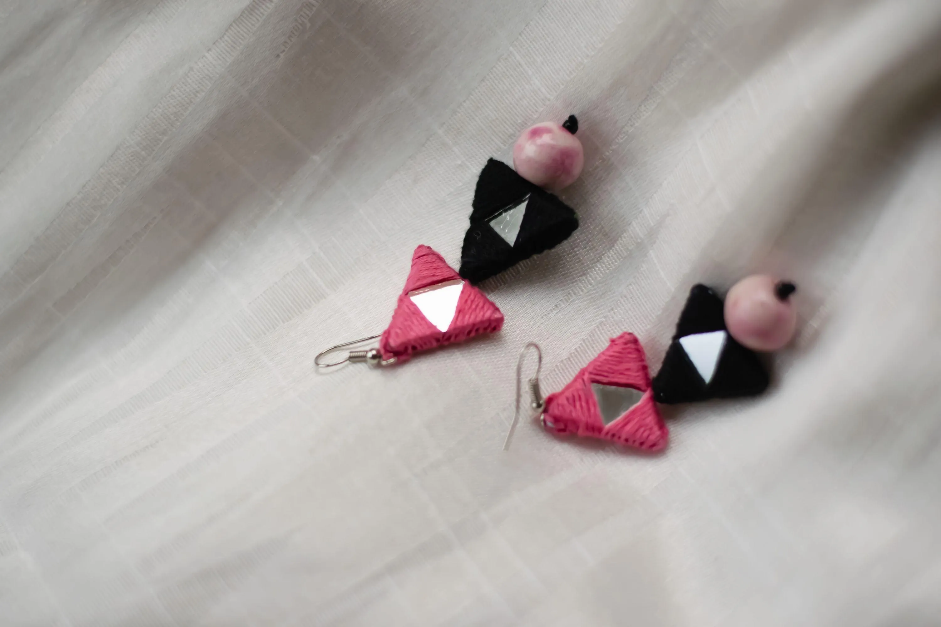 Kaisori Triad thread pottery earrings - pink and white