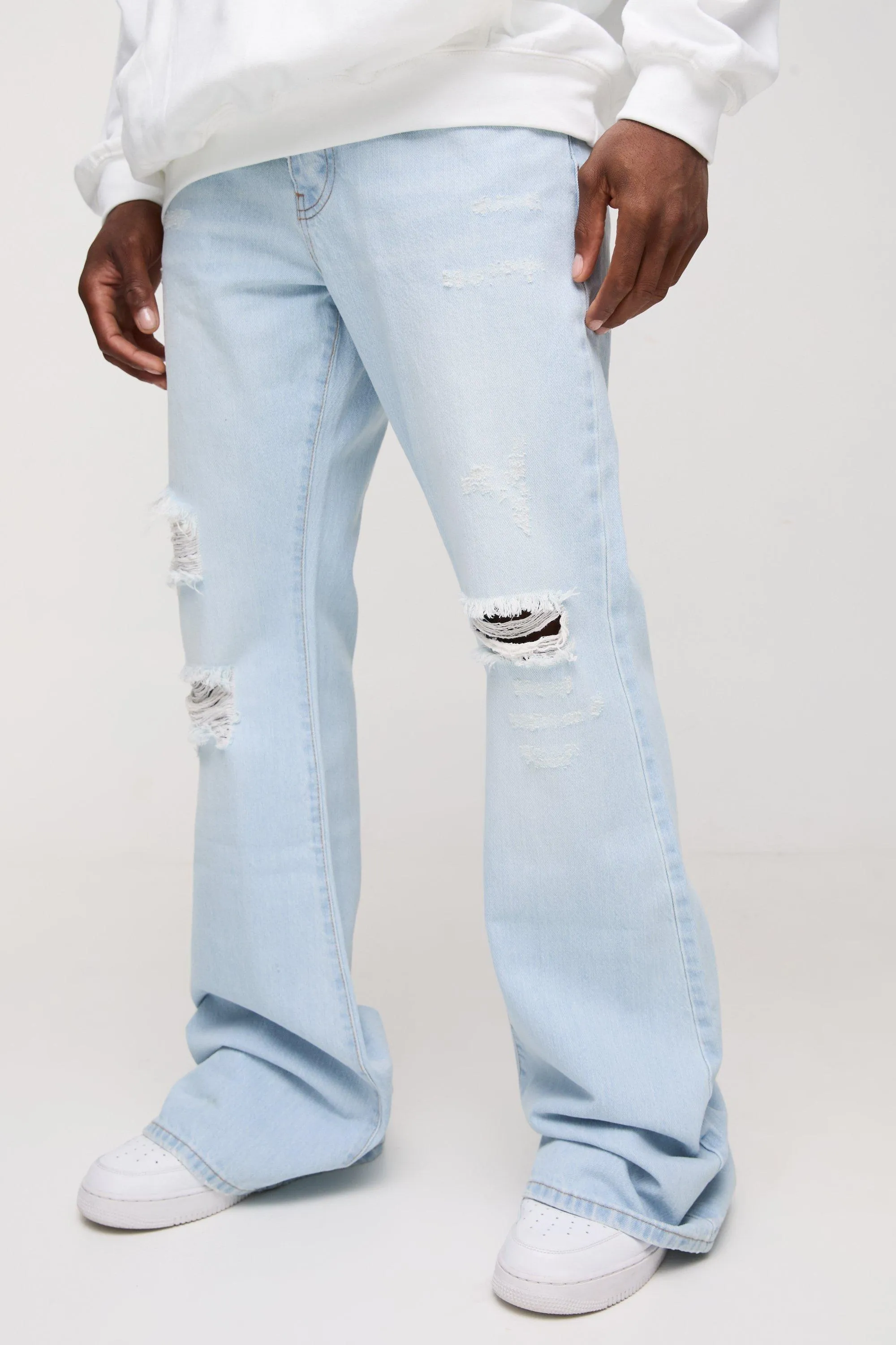 Relaxed Rigid Flare Stacked Knee Rip Denim Jeans