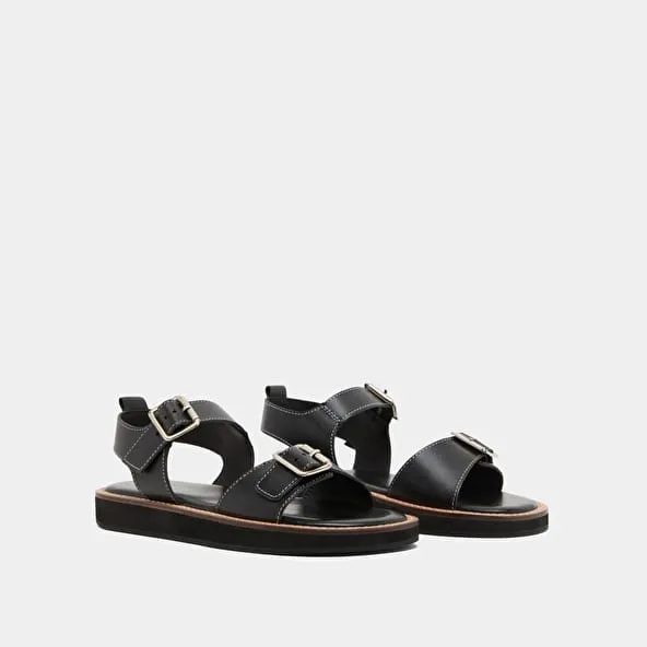 Sandals with adjustable buckles in black leather