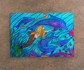 Swimming with Dolphins Cutting Board